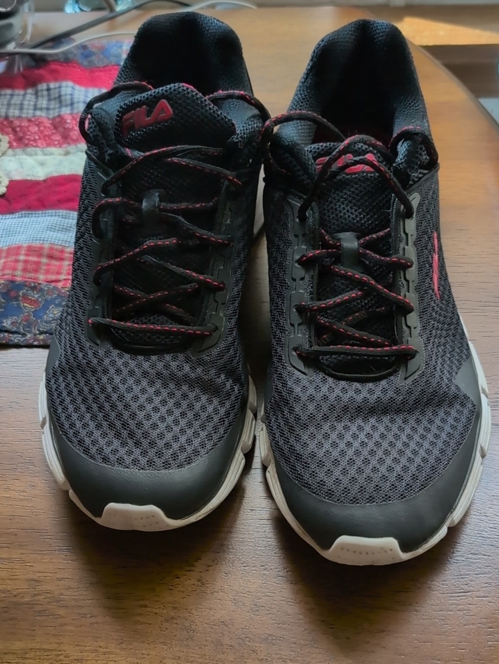 Fila Men’s Black Athletic Shoes with Red Highlights